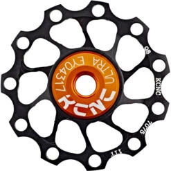KCNC Ultra Galet 11 Dents, Roulement Acier Inox, Noir/orange